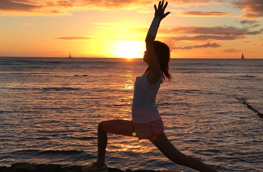 Waikiki yoga class at Queens Surf Beach in Kapiolani Park