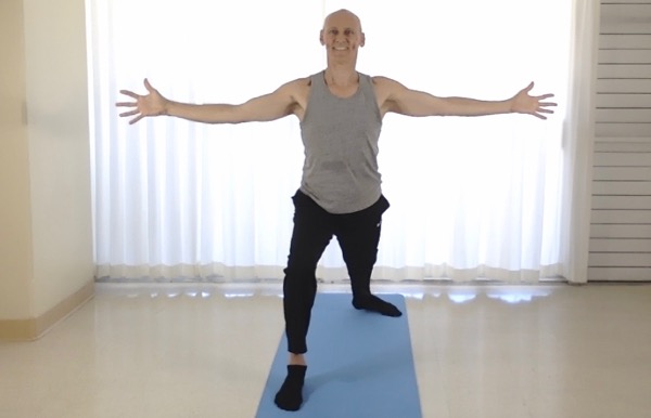 Tedd Surman demonstrating virabhadrasana from Waikiki zoom class