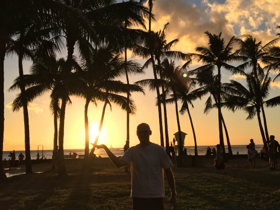 Sunset yoga class Waikiki Sans Souci beach in Honolulu with Tedd Surman